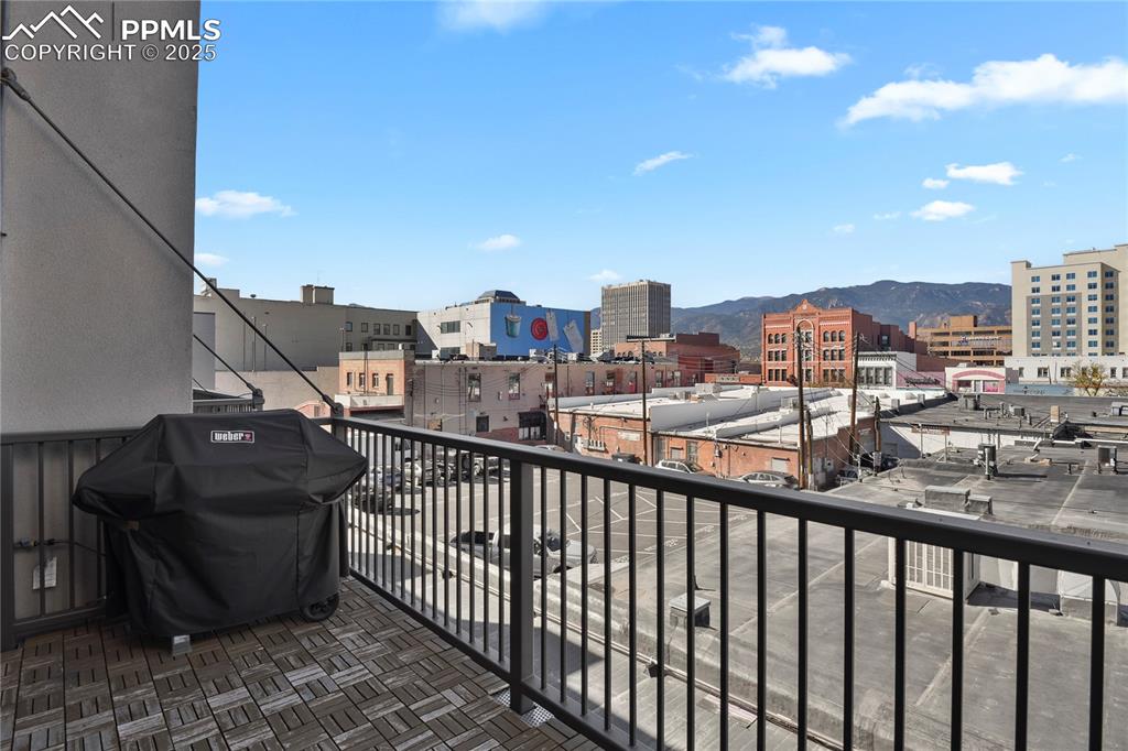 Image 14 of 33: Enjoy sunset views of the city, mountains and park from your private west-f