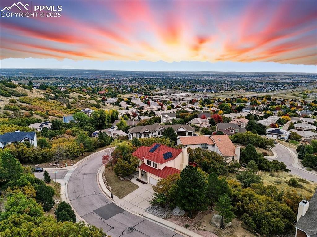 Image 31 of 31: Aerial view at dusk of a residential view
