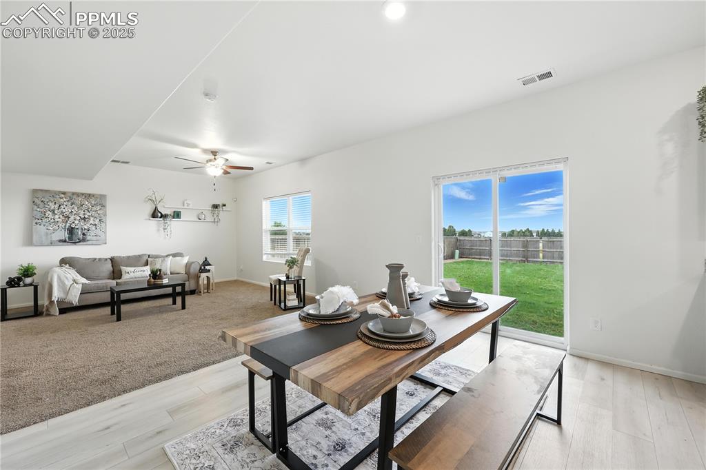 Image 14 of 47: Lots of natural light from the large view windows to the backyard.