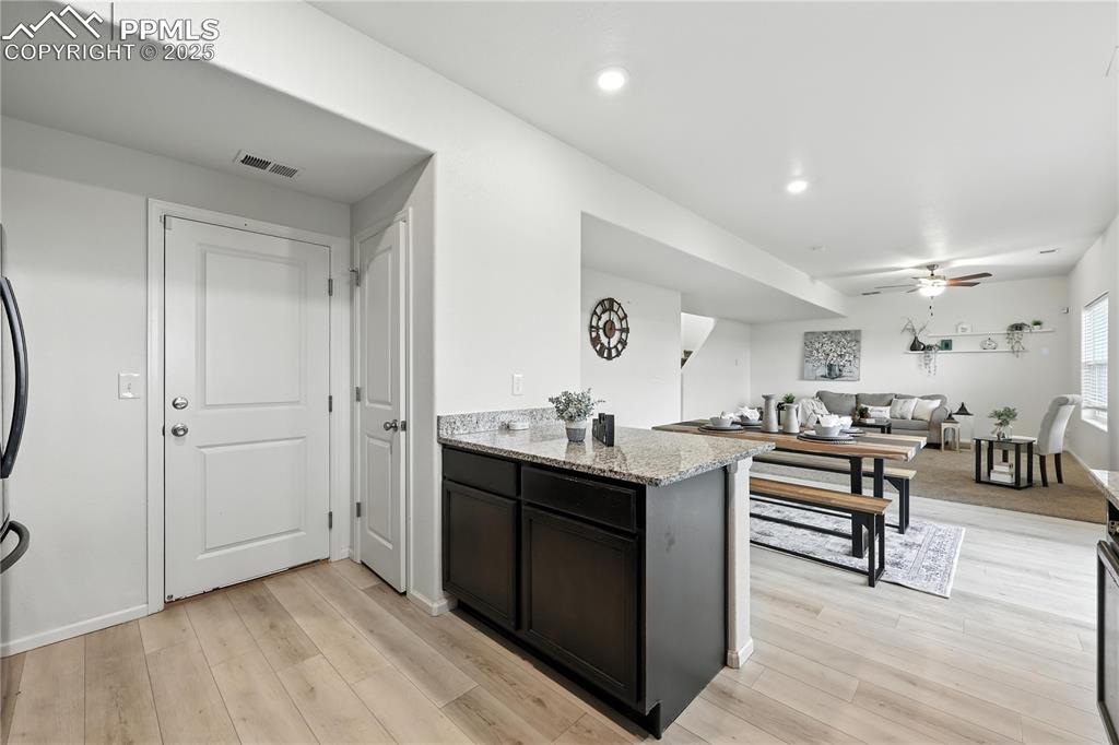 Image 20 of 47: Garage access off the Kitchen.