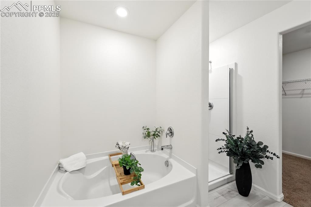 Image 28 of 47: Soaking tub in the Primary Bathroom.