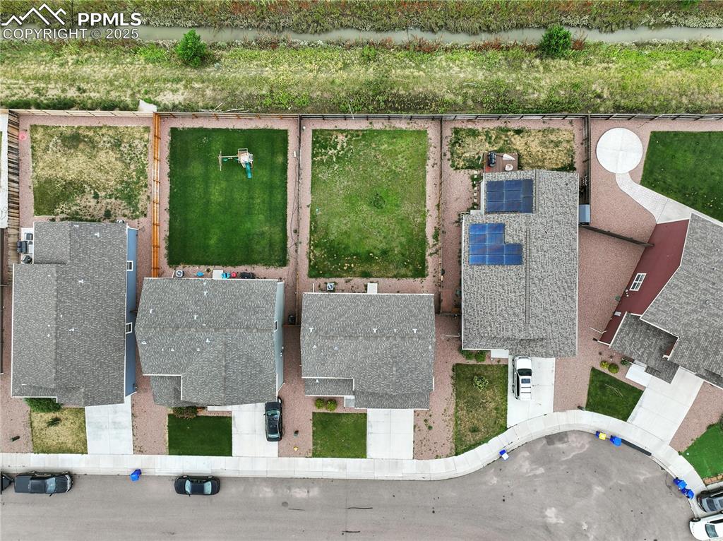 Image 43 of 47: Aerial view of home and lot.