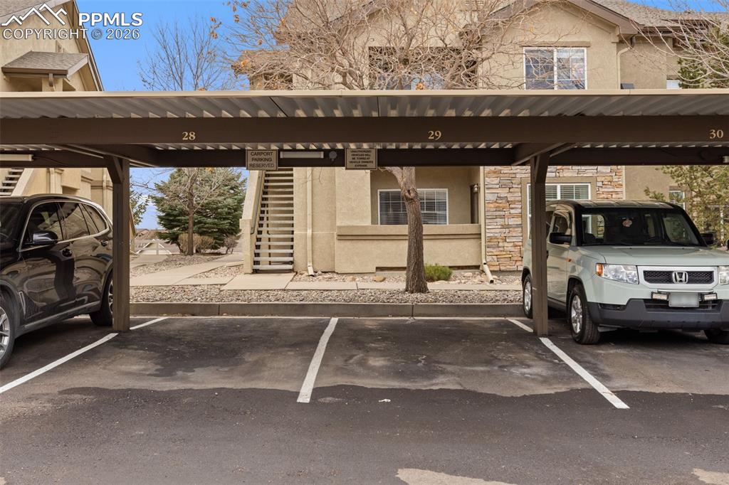 Image 26 of 26: Covered assigned parking