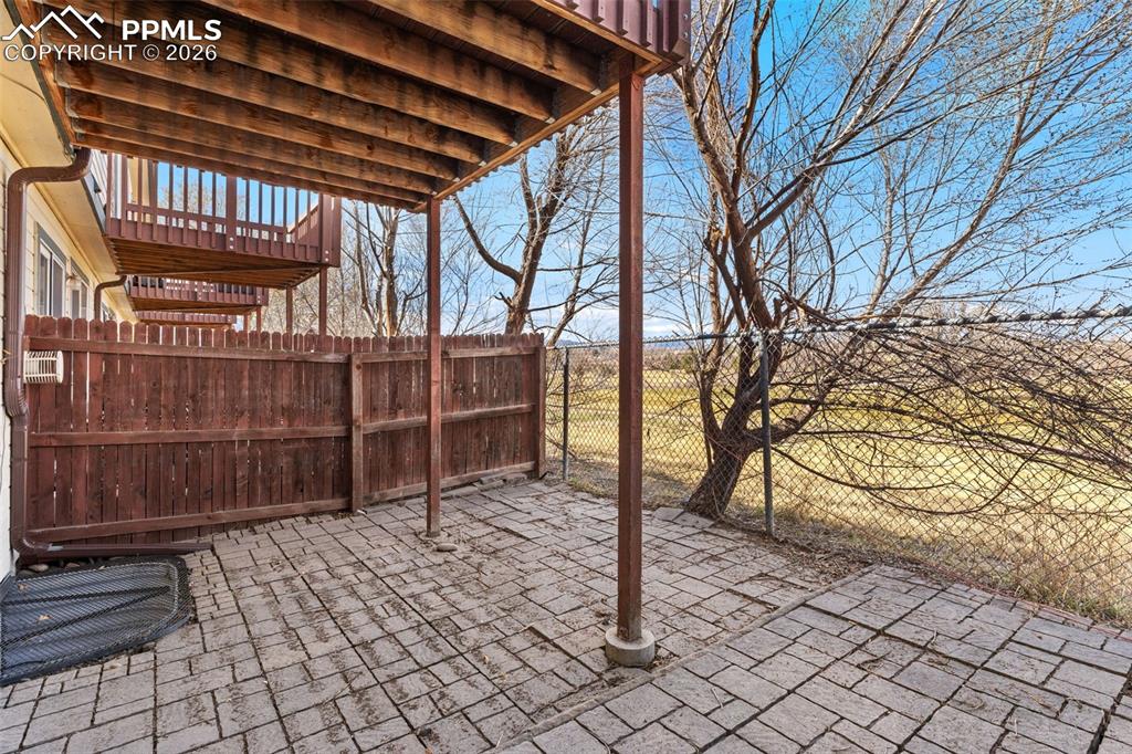 Image 25 of 26: Spacious patio that backs to the golf course.