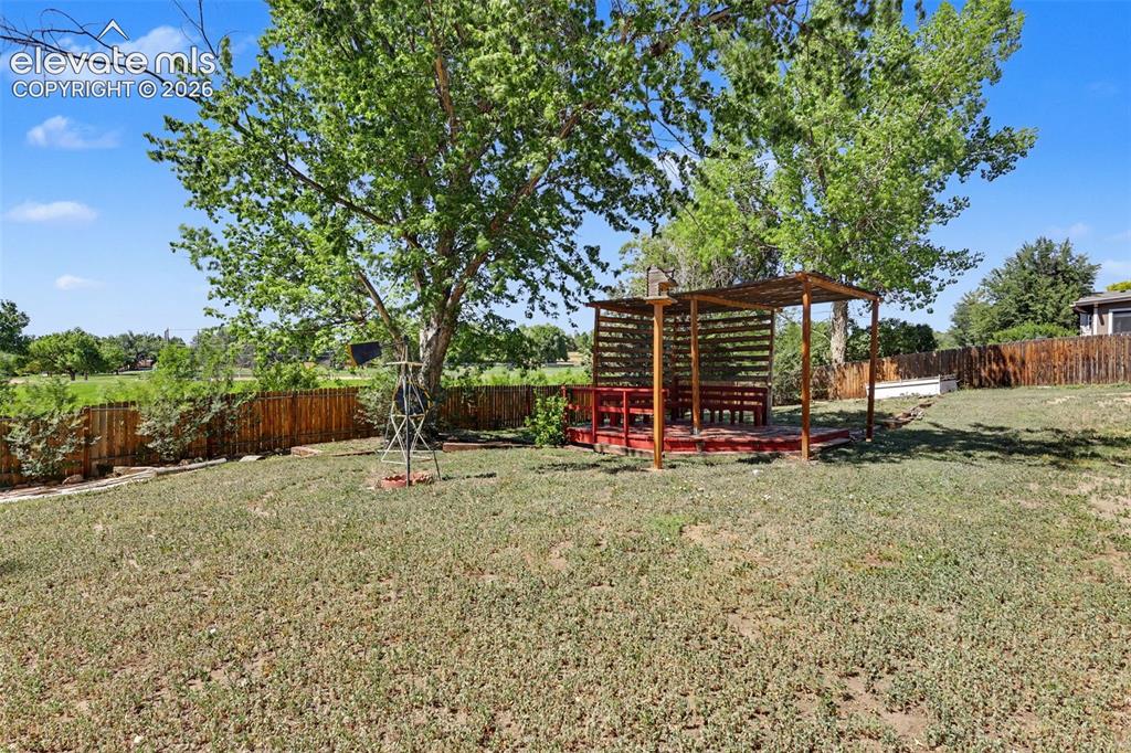 Image 15 of 17: Private backyard backing to neighborhood greenbelt/trail corridor and open 