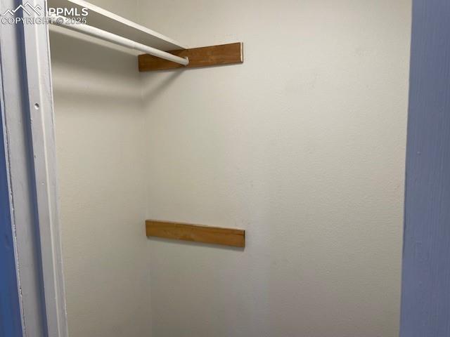 Image 13 of 21: View of walk in closet