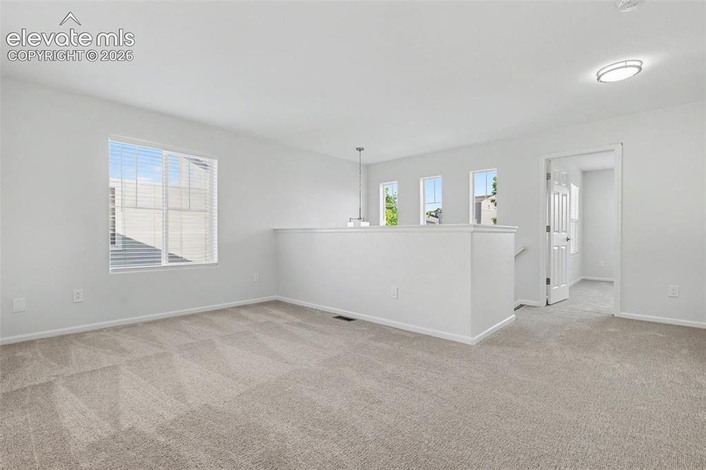 Image 13 of 27: Spacious loft area