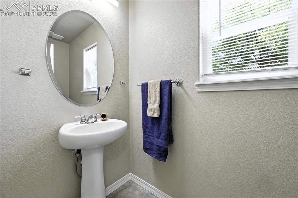 Image 4 of 46: Bathroom featuring a sink
