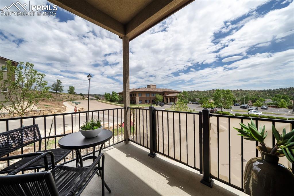 Image 12 of 42: Enjoy the solitude and open space views from the patio.