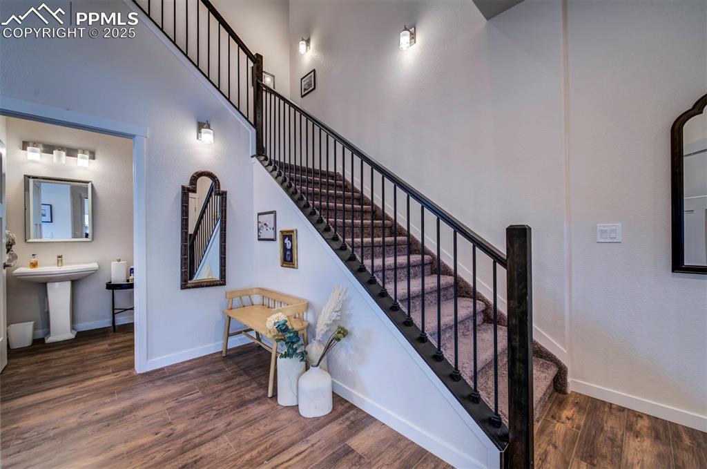 Image 19 of 42: Powder room is conveniently located.