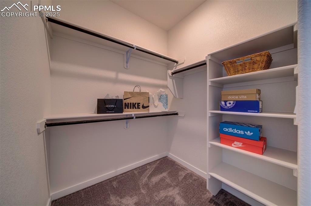 Image 30 of 42: Primary bedroom has two closets. This is closet two.
