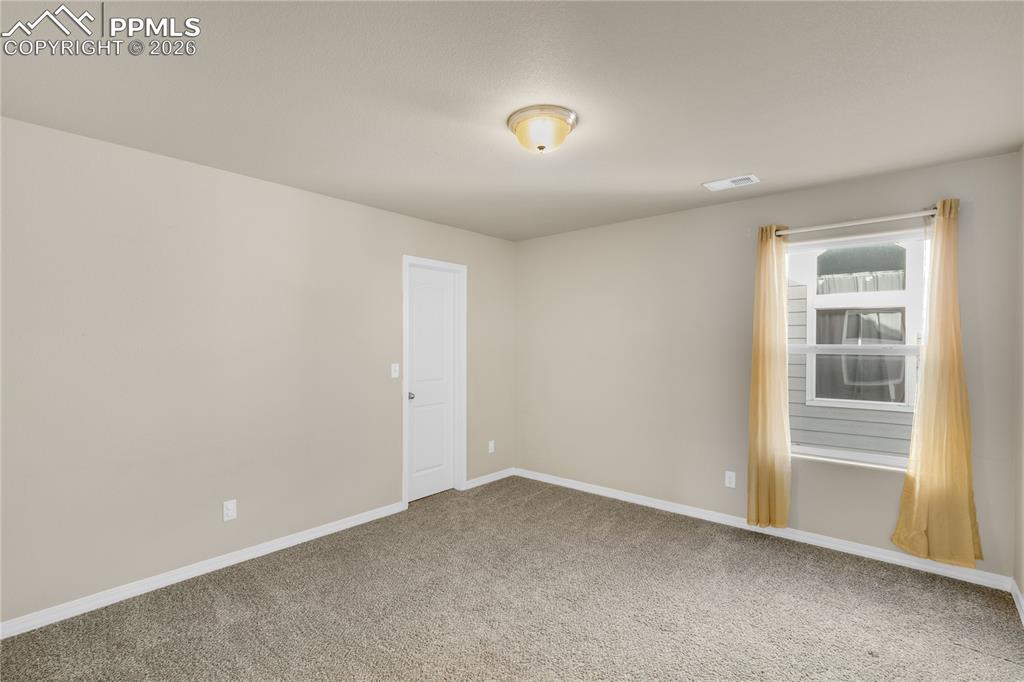 Image 34 of 43: Bedroom