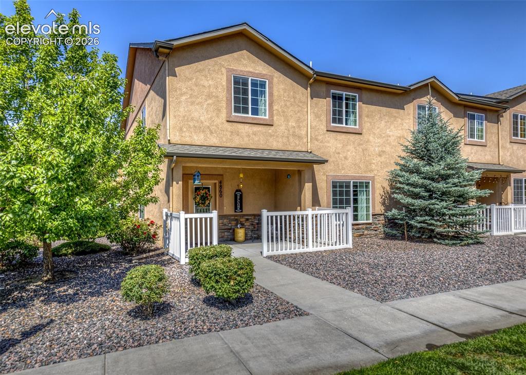 Image 1 of 36: Front of end-unit townhome