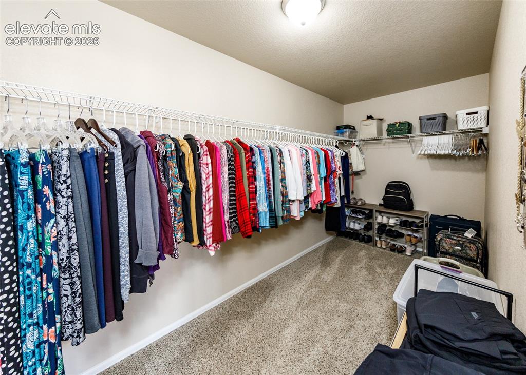 Image 18 of 36: Master closet