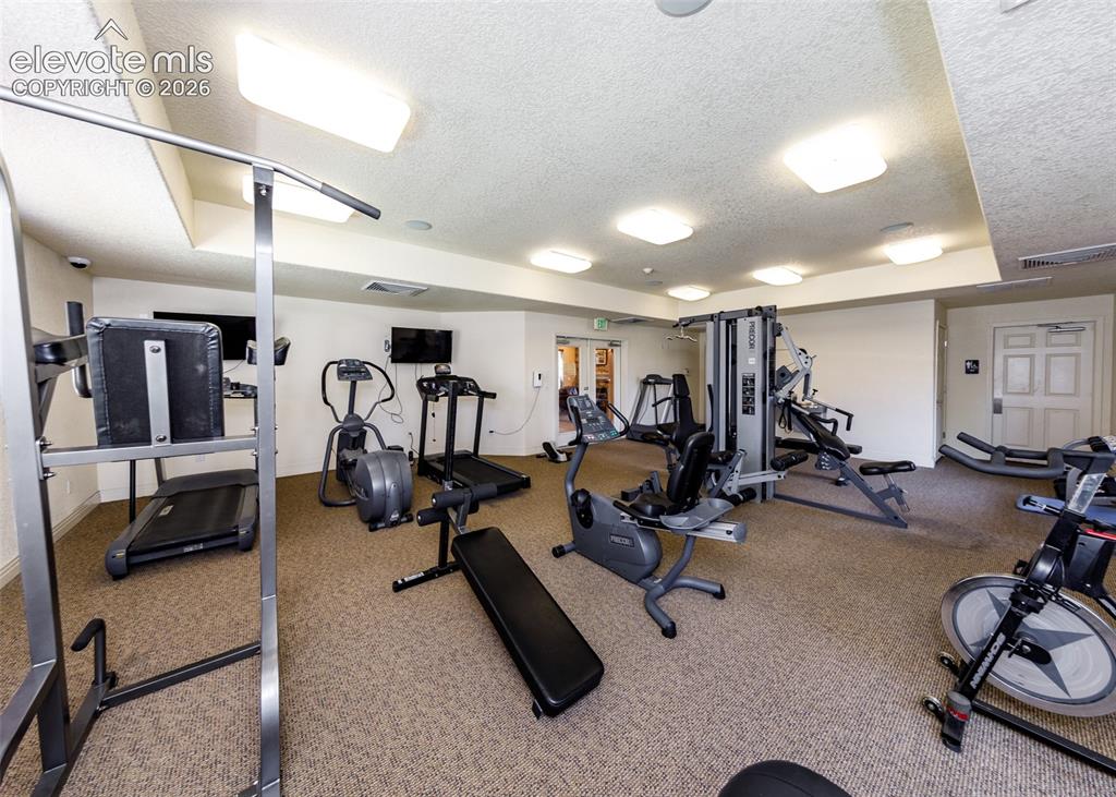 Image 32 of 36: Clubhouse workout room