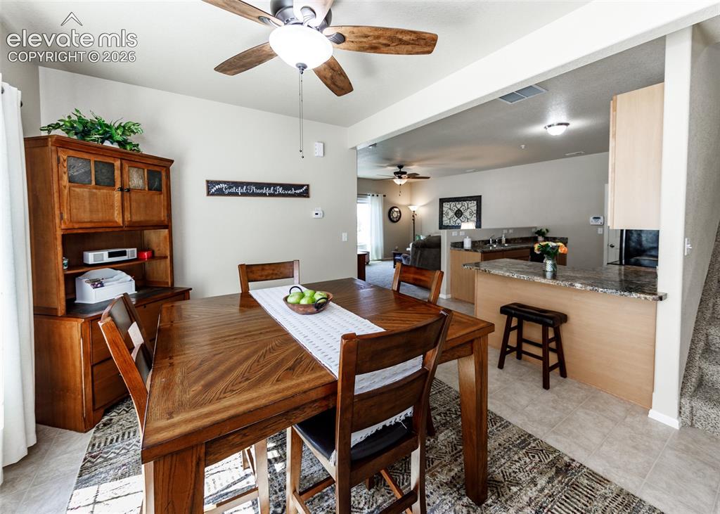 Image 9 of 36: Dining room looking into kitchen