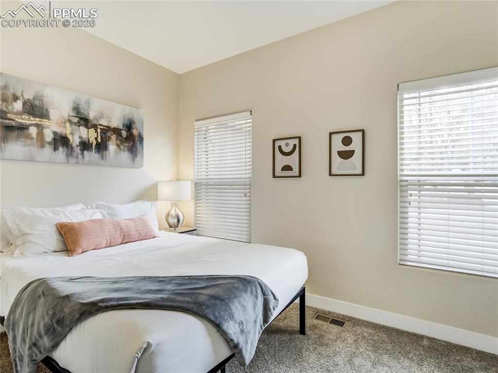 Image 21 of 47: View 2 of main level bedroom