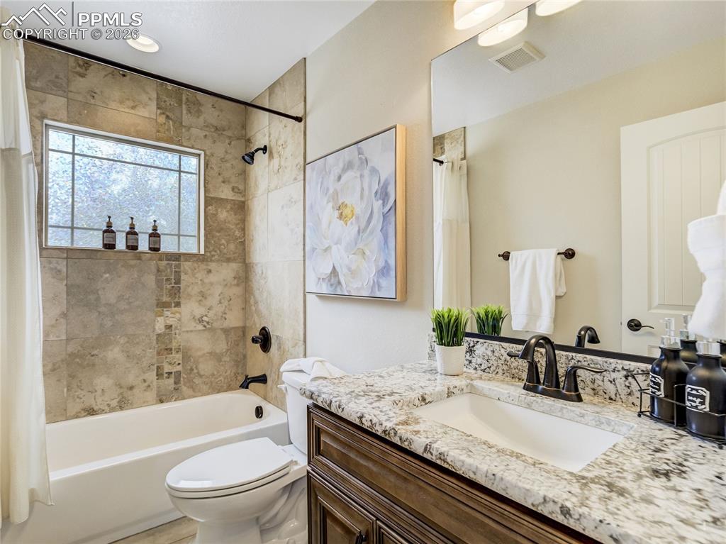 Image 22 of 47: Main level full bathroom