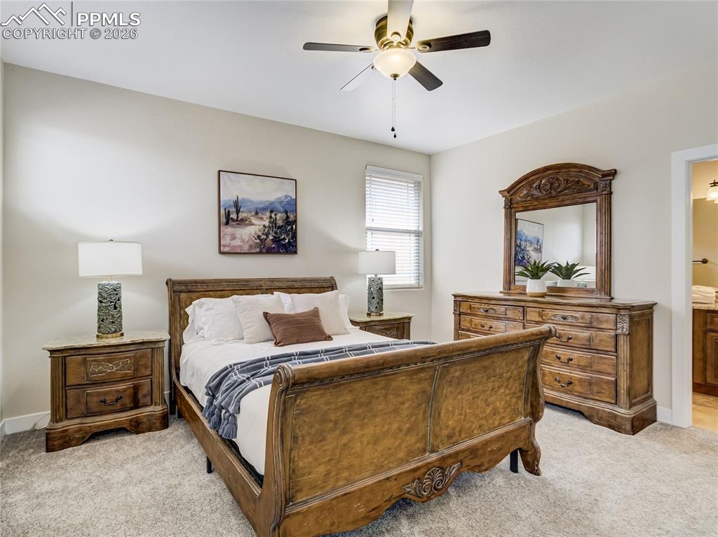 Image 31 of 47: Secondary upstairs bedroom with en-suite bath.