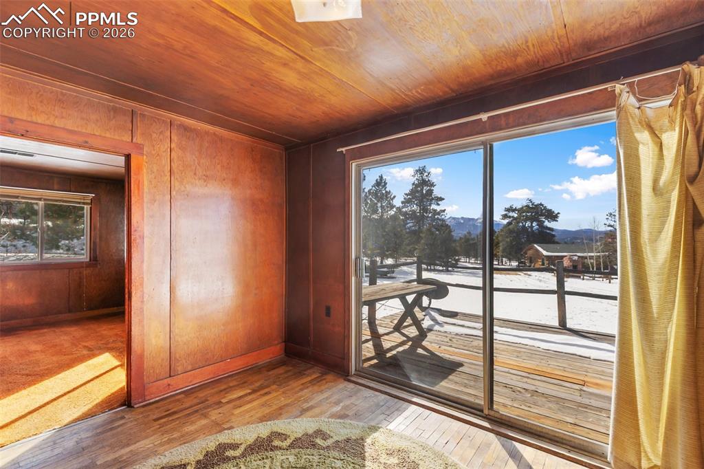 Image 42 of 50: 2nd residence dining room with views of Pikes Peak