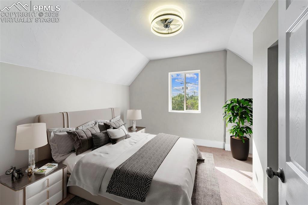Image 17 of 35: Virtually Staged / Light-filled bedroom with ample space for personal touch