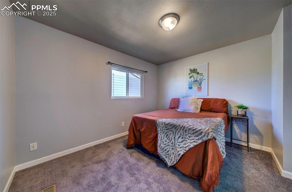 Image 15 of 21: Bedroom