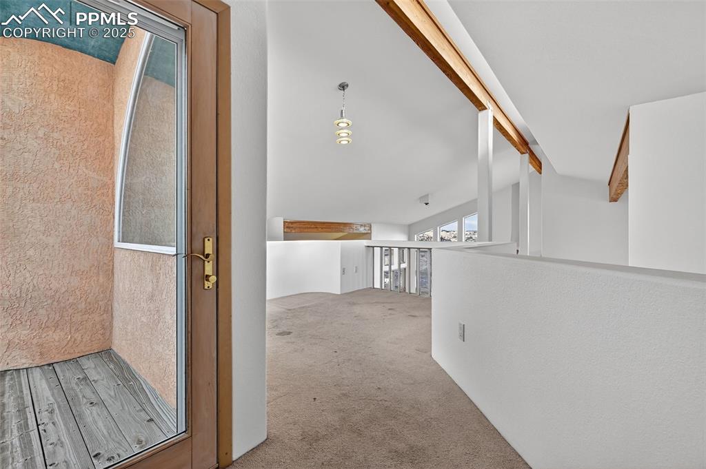 Image 30 of 50: Corridor with carpet floors