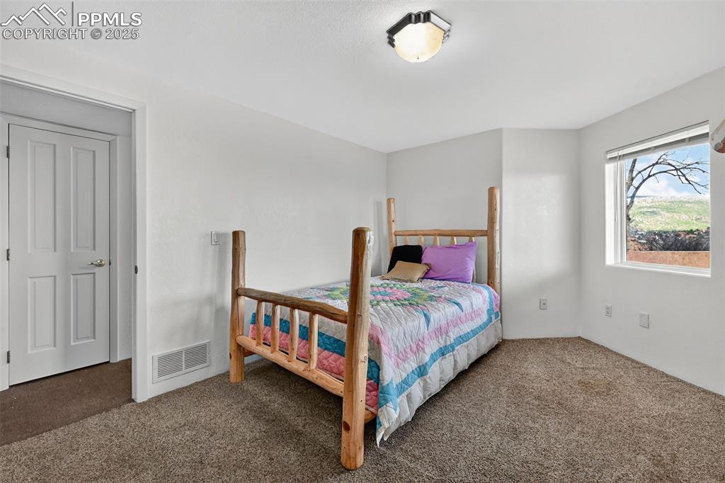 Image 40 of 50: View of carpeted bedroom