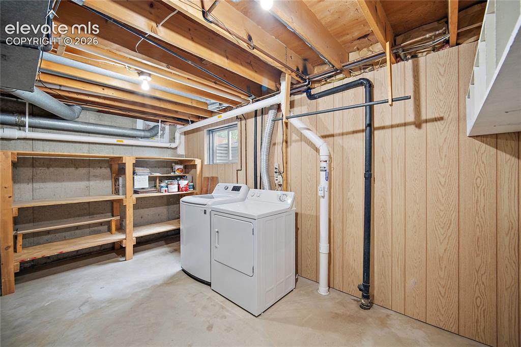 Image 22 of 42: Basement laundry and storage. 