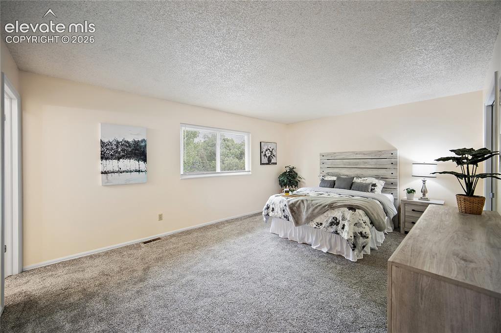 Image 23 of 42: Upstairs primary bedroom