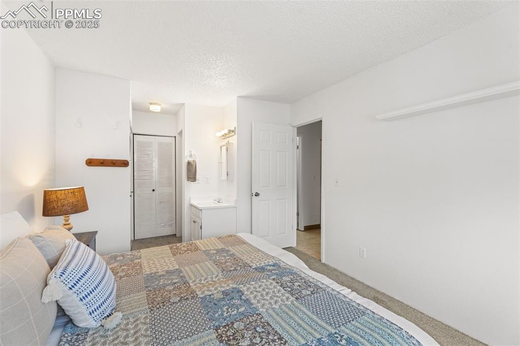 Image 15 of 20: Master Bedroom