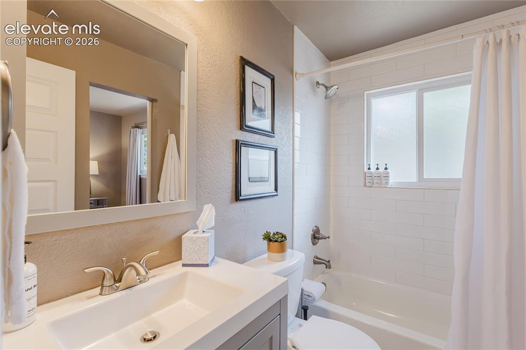Image 10 of 49: Main level bathroom
