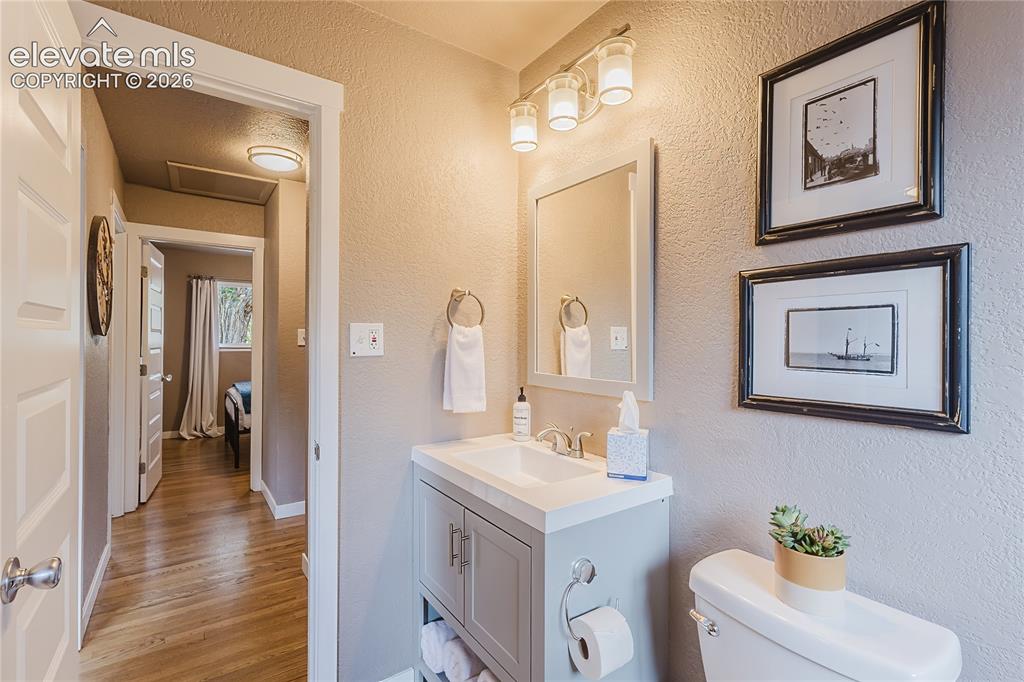 Image 11 of 49: Main level bathroom