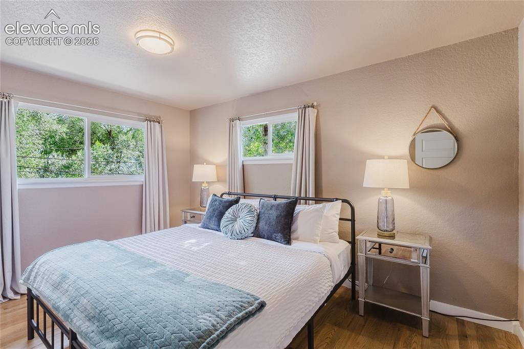 Image 12 of 49: Primary bedroom that walks into the bathroom
