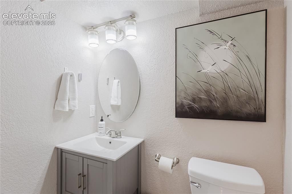 Image 35 of 49: Bathroom in lower level