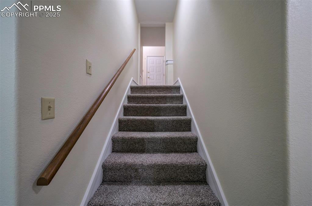 Image 34 of 40: Stairway to basement