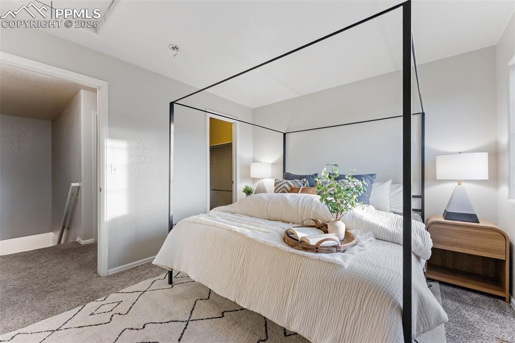 Image 16 of 45: Bedroom with carpet and baseboards