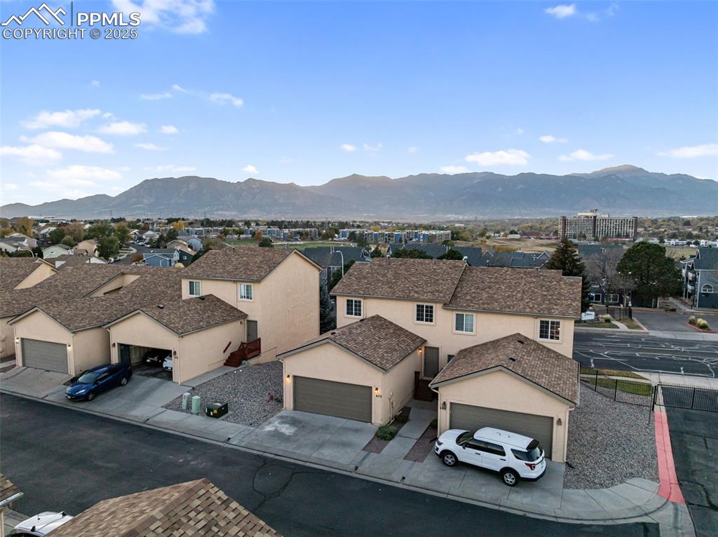 Image 2 of 45: Mountain view featuring nearby suburban area