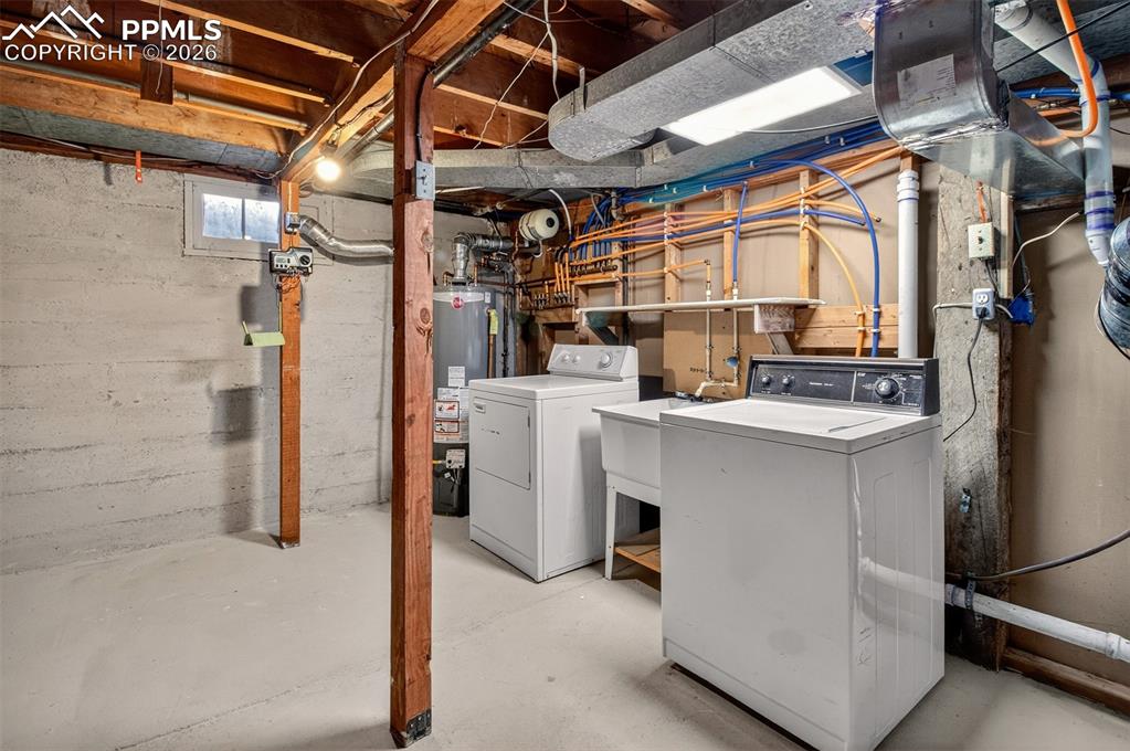 Image 31 of 37: Large storage space and laundry area