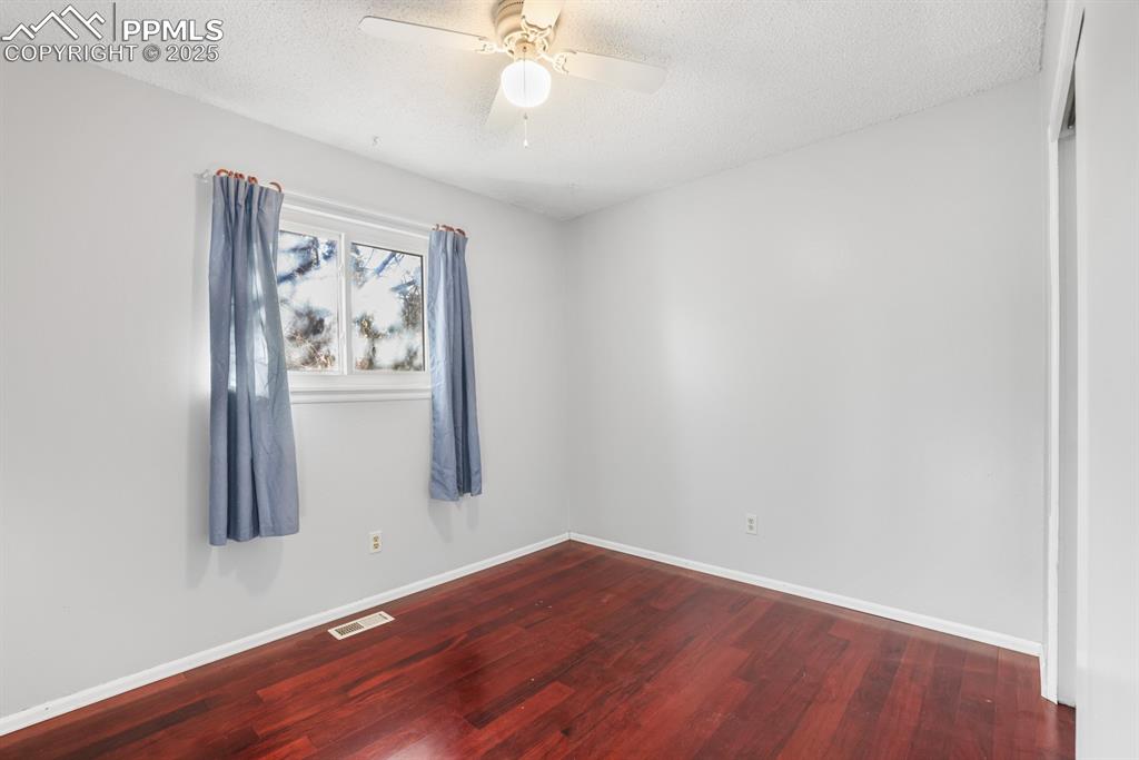 Image 12 of 19: Second bedroom