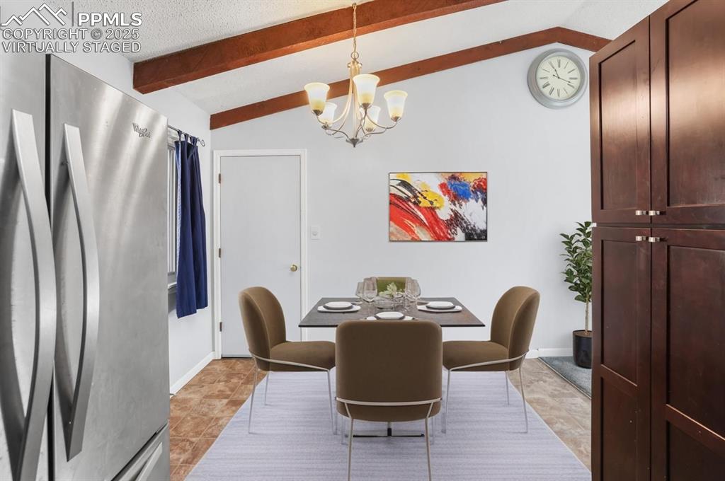 Image 3 of 19: Dining area in the eat-in kitchen.  Virtually staged.