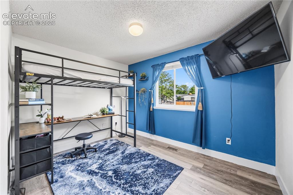 Image 17 of 31: Upper Level Primary Bedroom with spacious walk in closet.