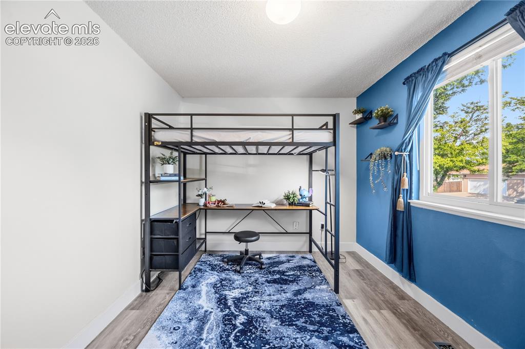 Image 18 of 31: Upper Level Bedroom #2 could also be a home office.