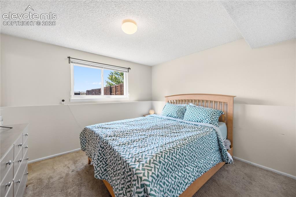 Image 21 of 31: Lower Level Family Rec Room can be used for entertaining, gaming, or media 