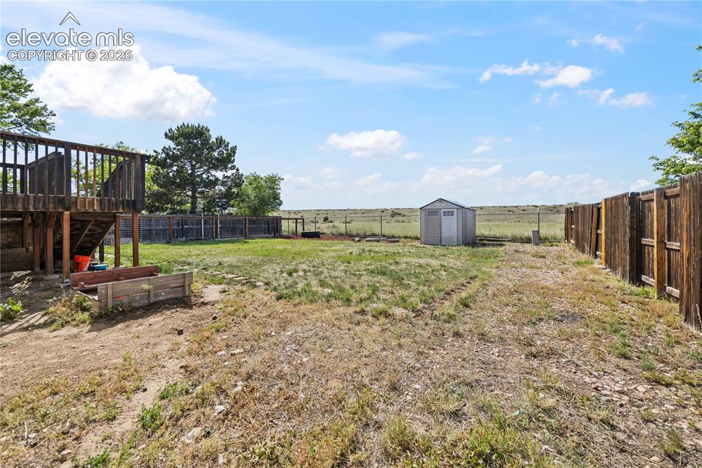 Image 30 of 31: Spacious backyard with lots of room for outdoor activities.