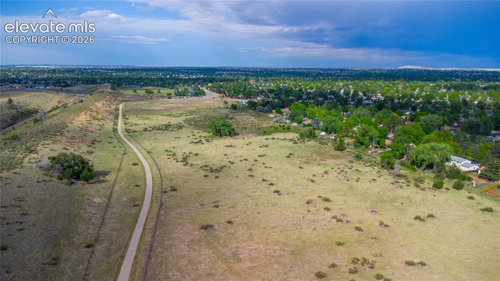 Image 31 of 31: The backyard backs to serene open space and includes a storage shed for too