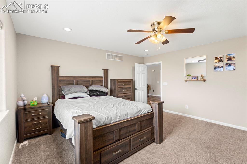 Image 13 of 34: Master Bedroom