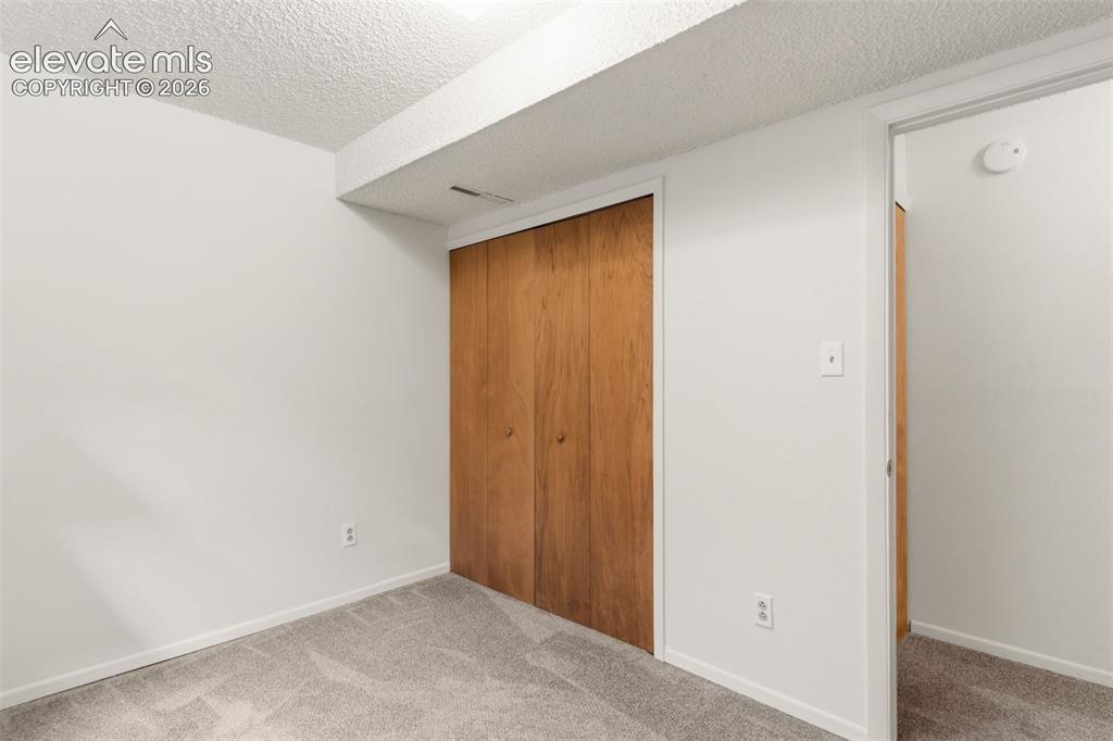 Image 23 of 31: 6th Bedroom or Hobby Room in Basement