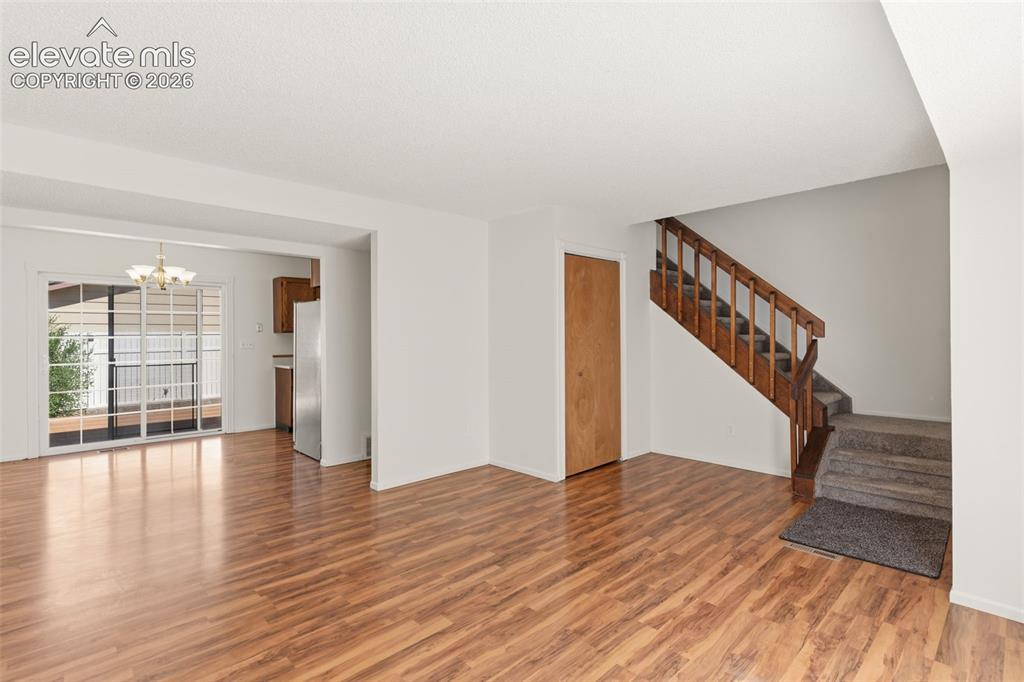 Image 4 of 31: Wood laminate flooring throughout the main level!