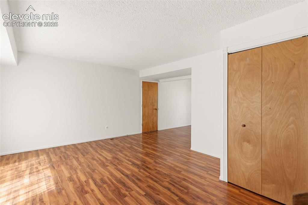 Image 5 of 31: Wood Laminate Flooring throughout the main level!